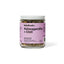 Jar of 'Ashwagandha + Chill' tea blend with a pink label on a white background