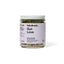 Jar of 'Gut Love' tea blend with a purple label on a white background