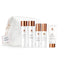 Set of skincare products with a white pouch on a white background