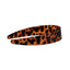 Leopard print headband on a light gray background